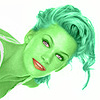 Natasha Henstridge transformed into an Orion Slave Girl (green skinned women of Star Trek)